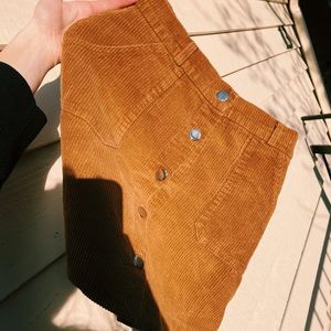 Corduroy mini skirt with silver buttons